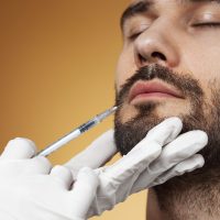 man-receiving-cosmetic-enhancements